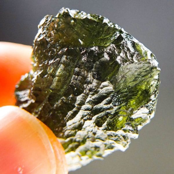 quality a+ shiny olive green moldavite with certificate of authenticity (7.79grams) 5
